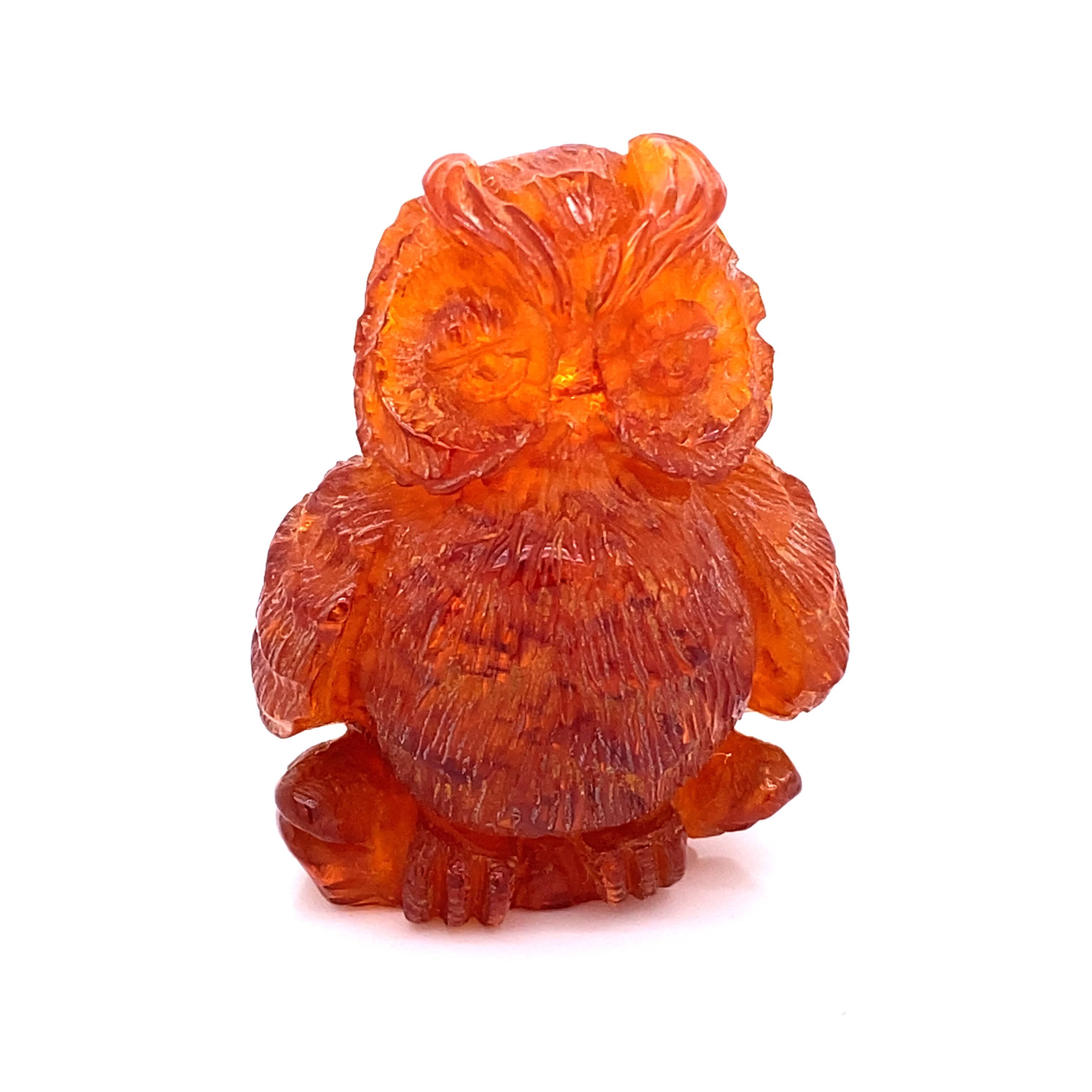 Hadcarved amber owl 10.4g. 40x30mm